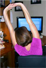Integrating Work Place Wellness - an ergonomic arm and back stretch!
